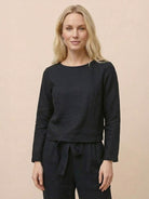 Woman wearing relaxed cotton-linen monochrome longline top and wide-leg pants set