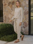 Cotton-linen monochrome two-piece set with relaxed longline top and wide-leg pants in neutral tones