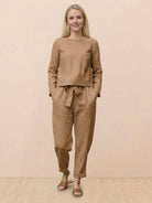 Cotton-linen monochrome minimalist capsule outfit with relaxed longline top and wide-leg pants