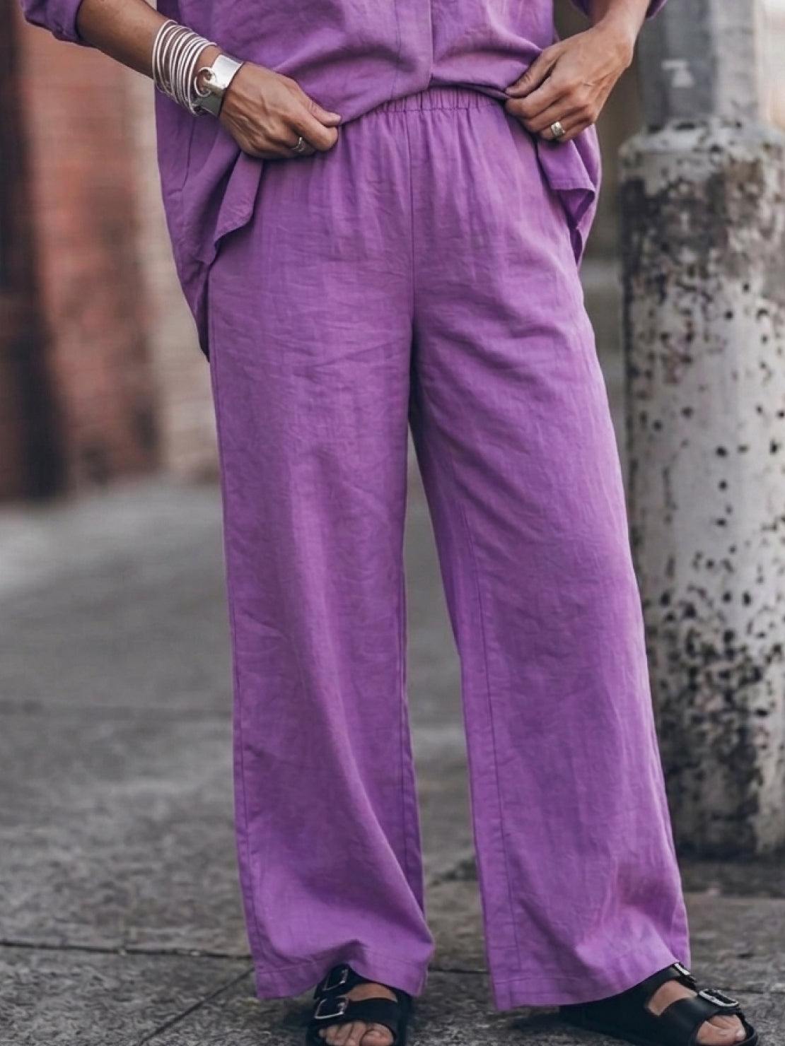 Woman wearing oversized 100% cotton shirt and wide-leg pants co-ord set in a relaxed fit