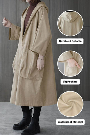 One size fits all oversized water resistant windbreaker jacket with hood and large pockets, lightweight and waterproof material.