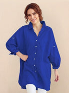 Oversized linen shirt made from breathable cotton and linen blend with relaxed fit and back button detailing