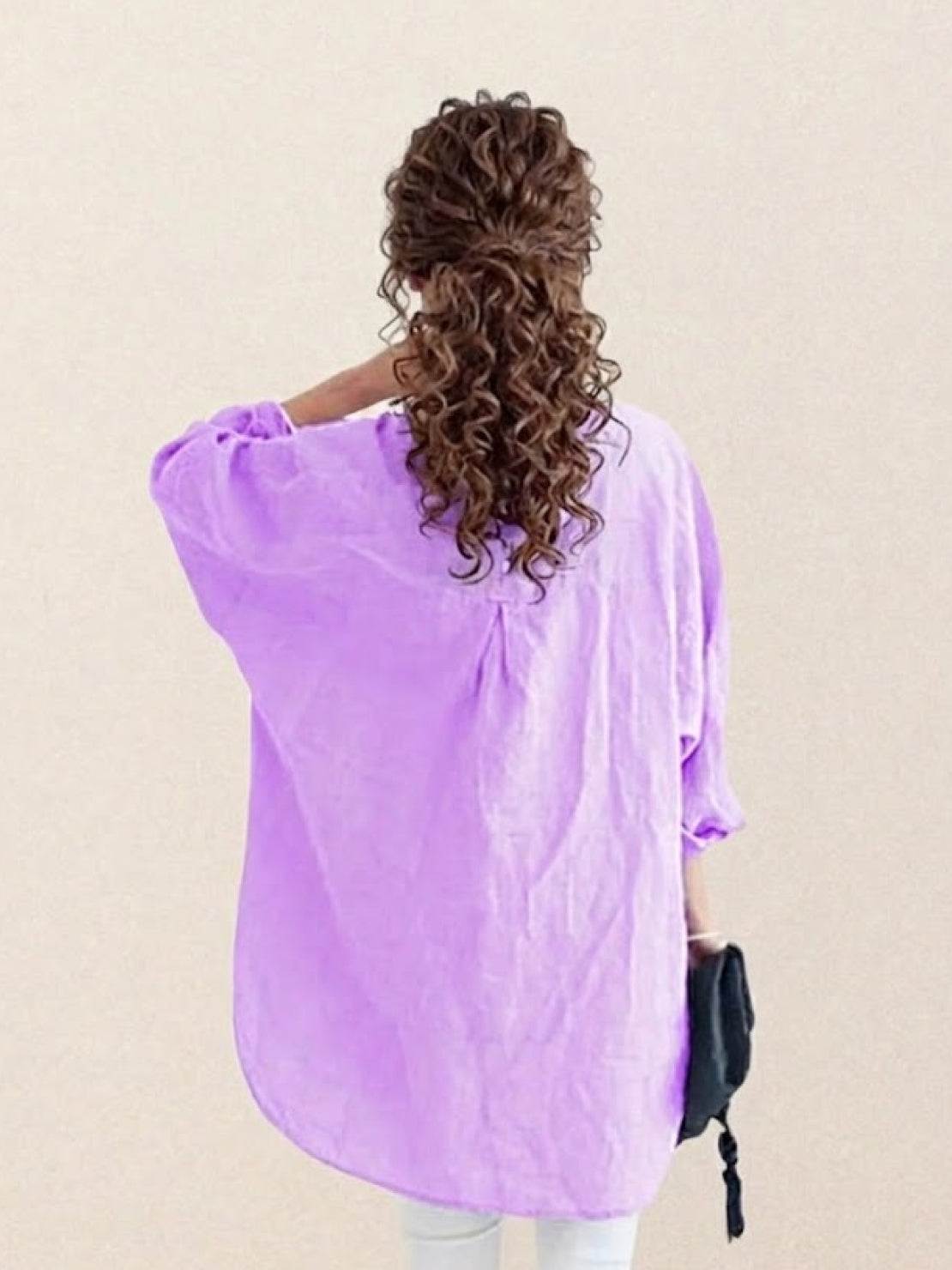 Oversized linen shirt with relaxed fit, breathable cotton-linen blend, and vintage back button detailing