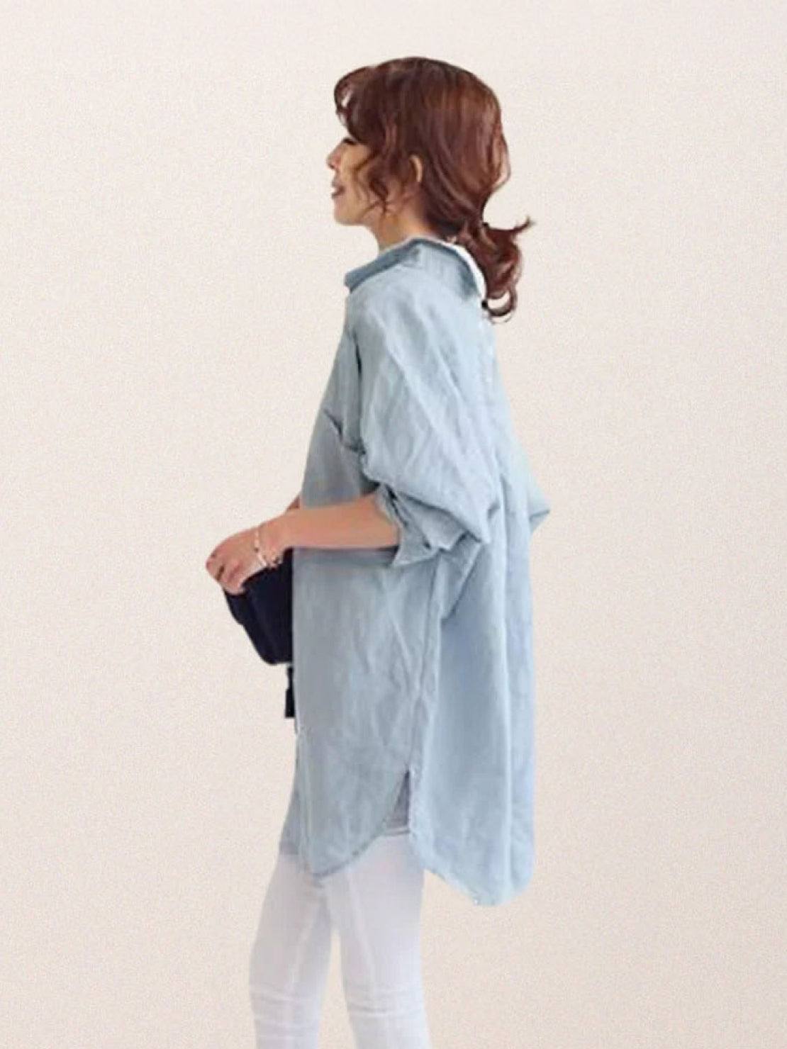 Oversized linen shirt with breathable cotton blend, relaxed fit, and back button detailing