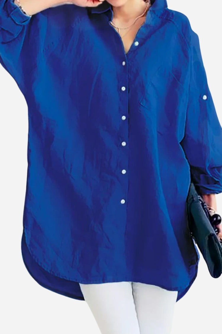 blue oversized linen shirt with long sleeves and button front in a relaxed fit style