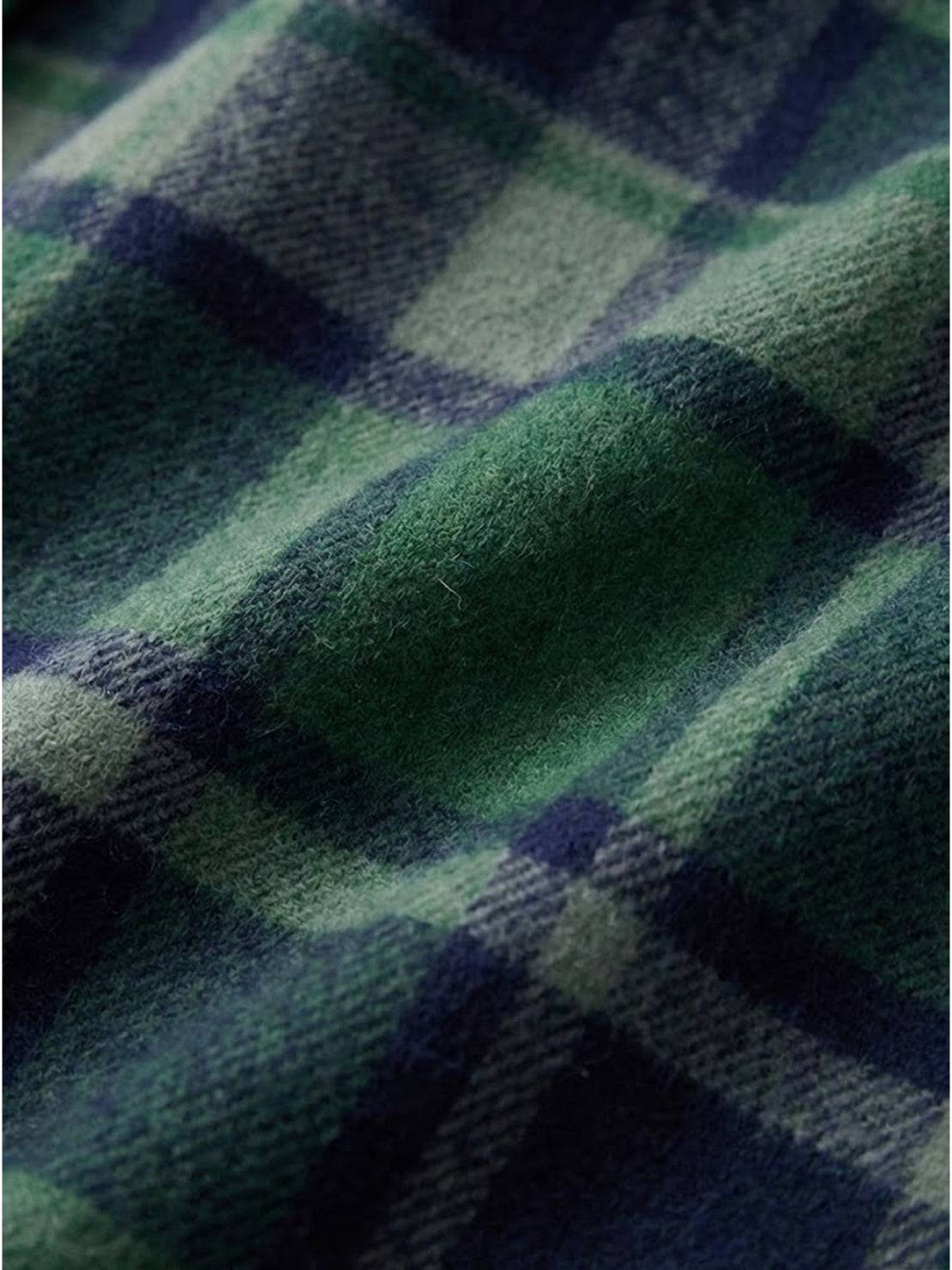 Oversized medium-length blue plaid overshirt with relaxed fit and wool-blend fabric