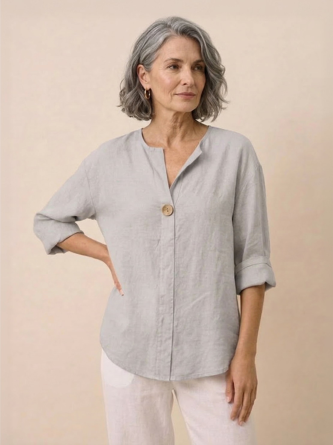 white pure linen age-defying shirt with button detail on hanger