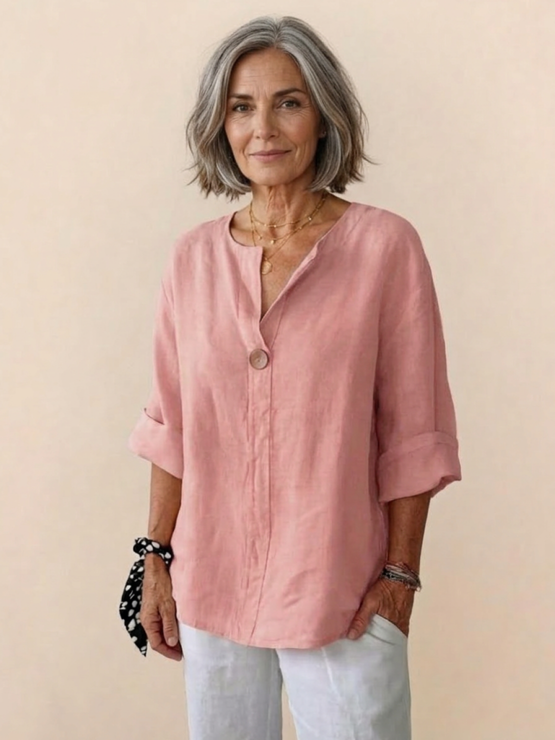 Pure linen age-defying shirt with button detail and breathable fabric on a hanger