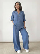 Woman wearing pure linen two-piece casual comfort set in light beige outdoors