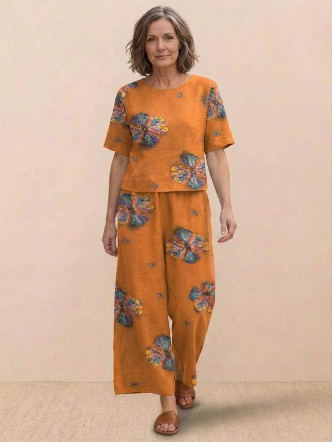 Loose fit co-ord set with soft-tailored top and wide-leg bottoms in breathable cotton blend fabric