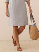 lightweight knee-length cotton dress with pockets and rolled 3/4 sleeves in earth tones