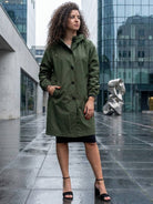 Water-Resistant oversized windbreaker rain jacket with hood and multiple pockets for outdoor activities